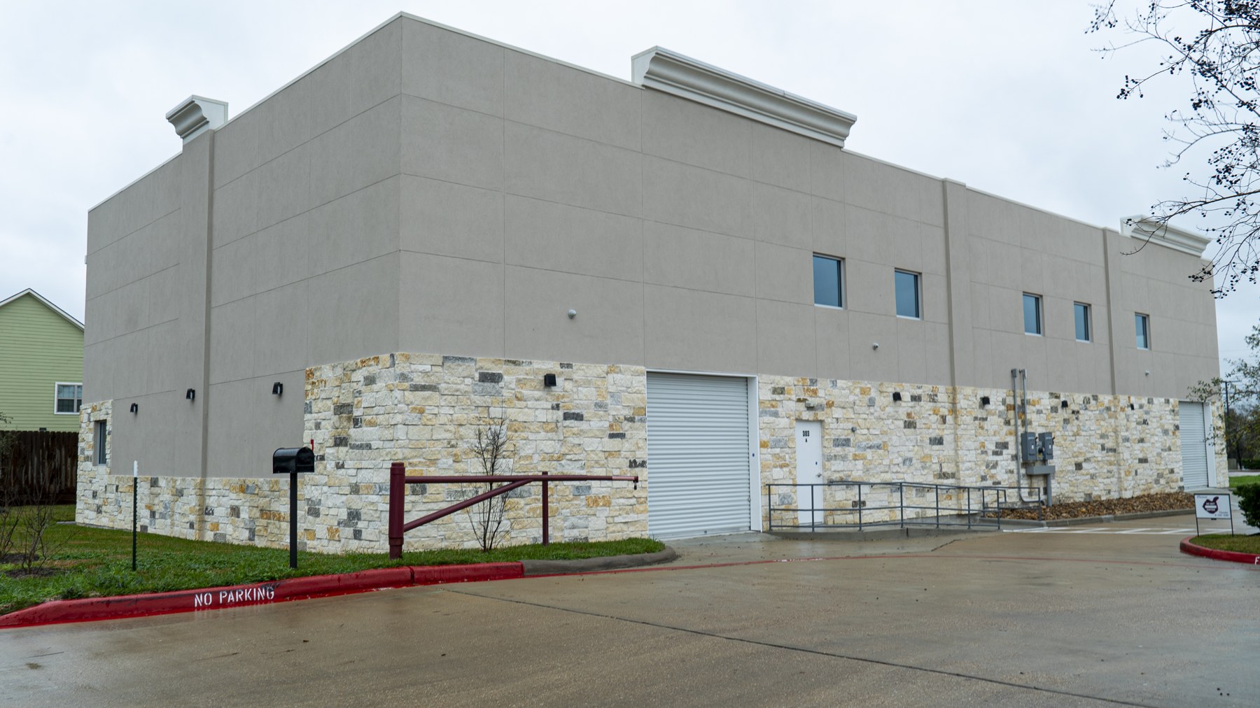Stone-clad warehouse exterior