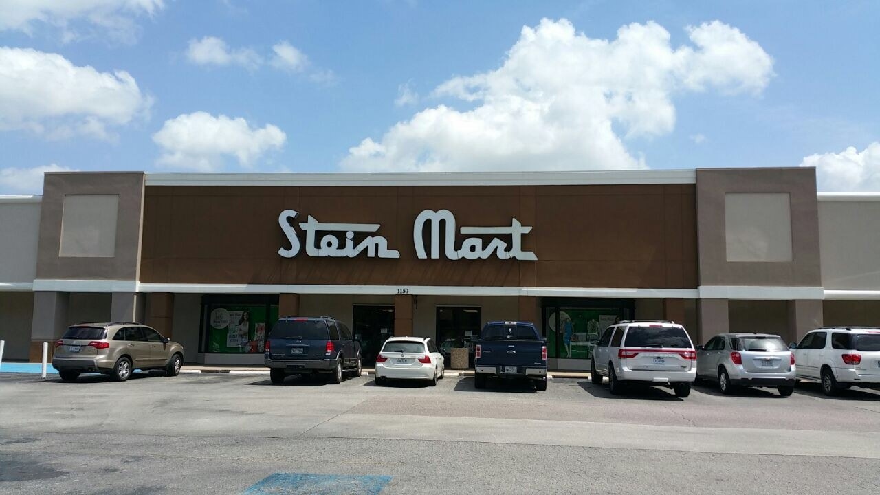Retail center frontage with a restrained architectural palette