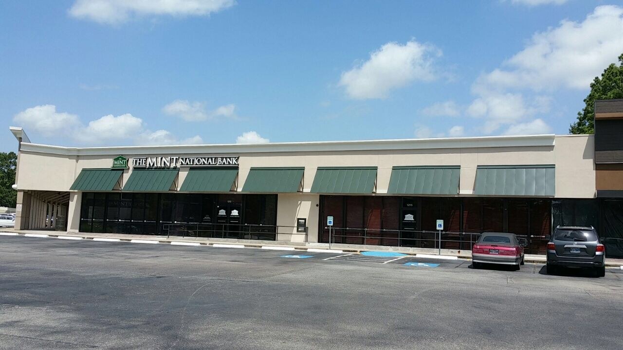 Wider view of the completed retail center exterior